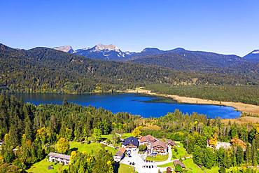 Lake Barmsee with alpine inn near Kruen, mountains Bischof and Krottenkopf in the Ester Mountains, Werdenfelser Land, drone shot, Upper Bavaria, Bavaria, Germany, Europe