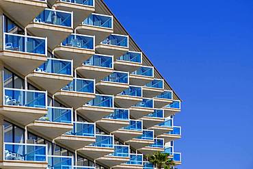 Balconies with blue glass railings at Hotel Cactus, El Albir, l'Alfas del Pi, Alicante, Spain, Europe