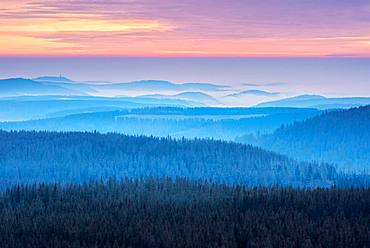 View over hilly landscape with valley fog at sunset, Harz National Park, Lower Saxony, Germany, Europe