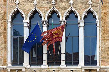 Waving flags of Europe and the Republic of Venice at Palazzo Zaguri, Venice, Venice, Italy, Europe