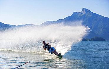 Man drives water ski, monoski, Mondsee, Salzkammergut, Upper Austria, Austria, Europe