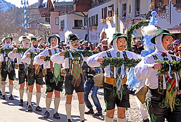 Bell stirrer in the Maschkera procession at carnival, Mittenwald, Werdenfelser Land, Upper Bavaria, Bavaria, Germany, Europe