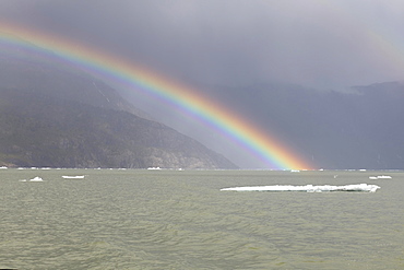 Rainbow over Caleta Tortel, Aysen Region, Patagonia, Chile, South America