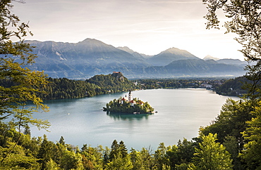 Lake Bled with the island Blejski Otok with St. Mary's Church, behind it Karawanken, Bled, Slovenia, Europe