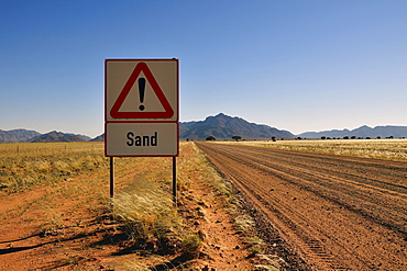 Road sign warns of sand, Namibia, Africa