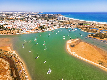 Aerial view, bay with yachts and view of coastal town Alvor, Algarve, Portugal, Europe