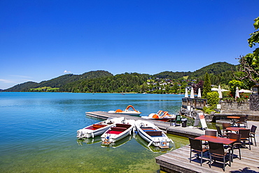 Pedal boats and electric boats at the landing stage on the lake promenade, Fuschlsee, Fuschl am See, Salzkammergut, Province of Salzburg, Austria, Europe