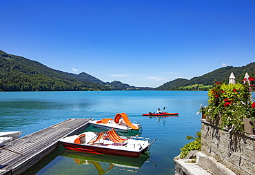 Pedal boats at the landing stage on the lake promenade, Fuschlsee, Fuschl am See, Salzkammergut, Province of Salzburg, Austria, Europe