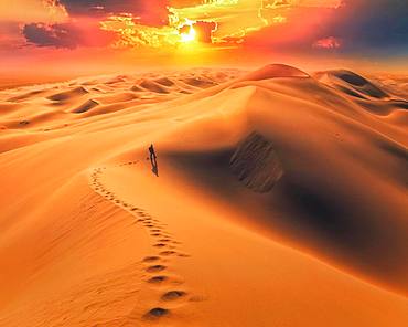 Amazing sunrise in Gobi desert. Khongor sand dunes, Umnugobi province, Mongolia, Asia