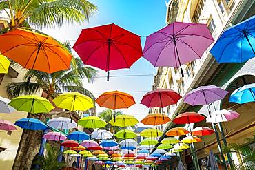 Colorful hanging umbrellas in Caudan waterfront, Mauritius, Africa