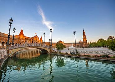 Plaza de Espana in the evening light with reflection, bridge over the canal, Sevilla, Andalusia, Spain, Europe