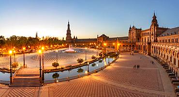 View over the illuminated Plaza de Espana at evening light, Sevilla, Andalusia, Spain, Europe