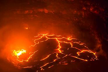 Glowing active lava lake, Erta Ale shield volcano, Danakil depression, Afar region, Ethiopia, Africa