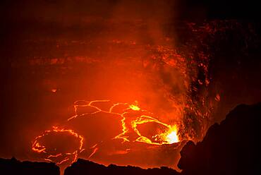 Glowing active lava lake, Erta Ale shield volcano, Danakil depression, Afar region, Ethiopia, Africa