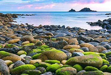 Rocky coast with round stones at Cape Cornwall, St Just, Penwith, Cornwall, England, Great Britain