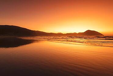 Wharariki Beach at sunset, Oceania, Golden Bay, Tasman, South Island, New Zealand, Oceania