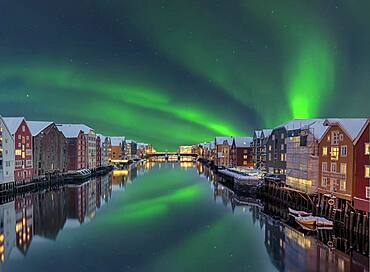 Northern Lights Bakklandet historical warehouses Trondheim Norway