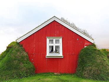 Traditional peat house Lindarbakki with red gable wall, Bakkageroi, Bakkagerdi, Borgarfjoerour, Borgarfjoerdur, Austurland, Iceland, Europe