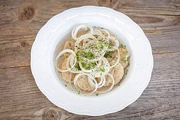 Vinegar dumplings with onion rings, chives, Bavarian snack, Schliersee, Bavaria, Germany, Europe