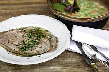 Boiled boiled beef with beef soup and chives, peas and carrots as creamy vegetables, Rauris, Pinzgau, Salzburger Land, Austria, Europe