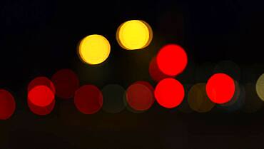 Abstract dark background with sparkling yellow and red lights, Barcelona, Spain, Europe