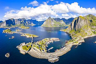 View of islands, fjord and mountains, fishing villages Hamnoy, Sakrisoy and Reine, Reinefjord, Lofoten, Norway, Europe