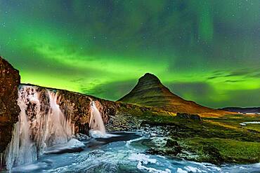 Aurora Borealis, Kirkjufellsfoss with Mount Kirjufell, Snaefellsnes Peninsula, Iceland, Europe