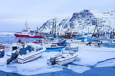 Fishing boats in the ice, harbour, Sisimiut, west coast, Greenland, North America