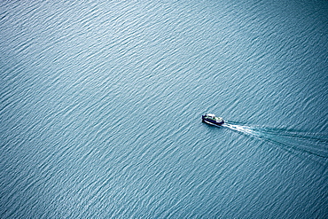 Boat on the lake Gjende, view from the Besseggen hike, Jotunheimen National Park, Vaga, Innlandet, Norway, Europe