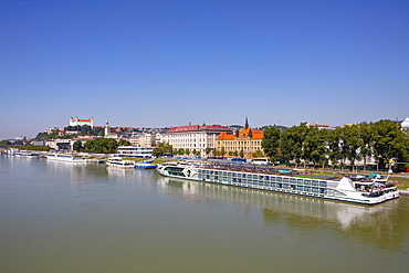 Landing stage for Danube cruise ships with a view to Bratislava Castle, Danube, Bratislava, Slovakia, Europe