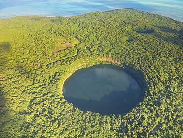 Aerial of Lalolalo lake volcanic crater lake, center of Wallis, Wallis and Futuna, Oceania