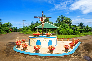 Christian statue at a road bend, Wallis, Wallis and Futuna, Oceania