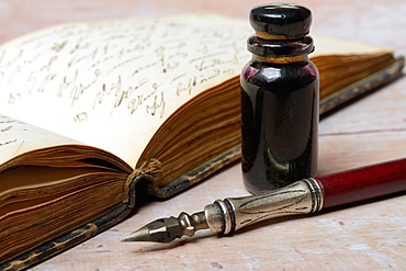 Penholder with quill, inkwell and old diary, Germany, Europe