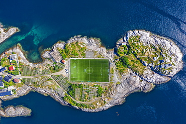 Aerial view, Henningsvaer with football stadium, rock island in the sea, Vestvagoy, Lofoten, Nordland, Norway, Europe