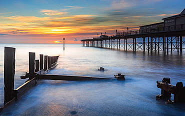 Sunrise in long time exposure of Grand Pier, Teignmouth, Devon, England, Great Britain