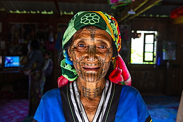 Chin woman with spiderweb tattoo, Mindat, Chin state, Myanmar, Asia