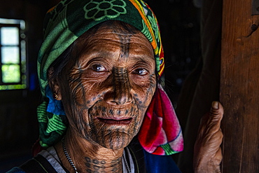 Chin woman with spiderweb tattoo, Mindat, Chin state, Myanmar, Asia