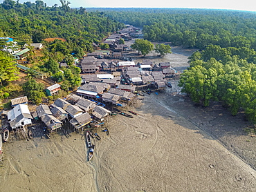 Aerial of Fishing village on stilts in the mangroves of the Mergui or Myeik Archipelago, Myanmar, Asia