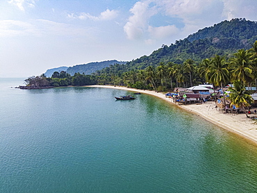 Aerial of a Moken, sea gypsy village on a white sand beach, Mergui or Myeik Archipelago, Myanmar, Asia