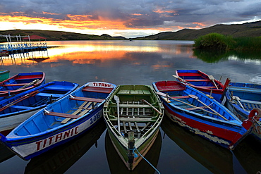 Rowboats on Laguna Sausacocha at sunset, Huamachuco, Sanchez Carrion Province, Peru, South America