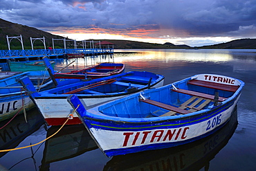 Rowboats on Laguna Sausacocha at sunset, Huamachuco, Sanchez Carrion Province, Peru, South America