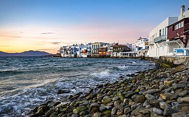 White Cycladic houses on the shore, Little Venice at sunset, Chora, Mykonos Town, Mykonos, Cyclades, Aegean Sea, Greece, Europe