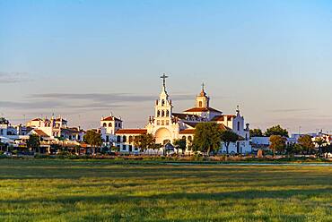 Village El Rocio with hermitage of El Rocio, hermitage Ermita del Rocio in the evening light, El Rocio, Almonte, province Huelva, Andalusia, Spain, Europe