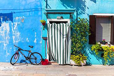 Bicycle in front of a blue house, colorful houses, colorful facade, Burano Island, Venice, Veneto, Italy, Europe