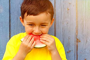 Summer watermelon child little boy eats, germany