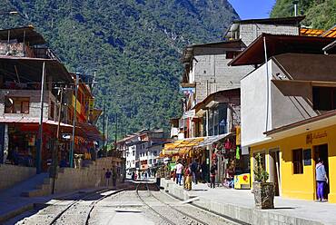 Railway tracks through the village of Aguas Calientes, Machu Picchu, Urubamba Province, Peru, South America