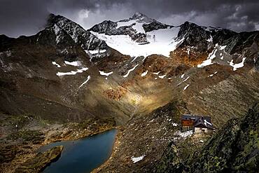 Hildesheimer Hut with Oetztal mountains and dramatic sky, Soelden, Oetztal, Tyrol, Austria, Europe