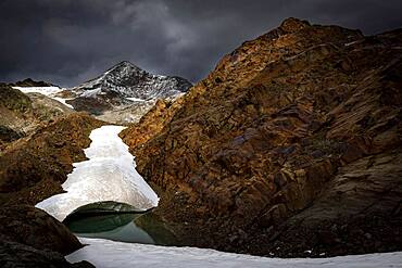 Oetztal mountains with glacier remains and dramatic sky, Soelden, Oetztal, Tyrol, Austria, Europe