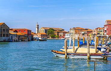 Colorful houses and boats on a canal of Murano, Murano Island, Venice, Veneto, Italy, Europe