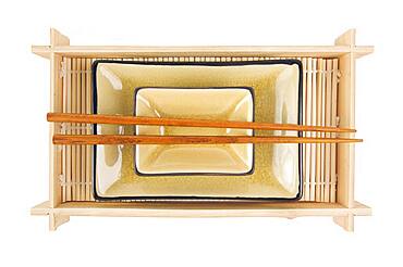 Abstract chopsticks and bowls isolated on a white background